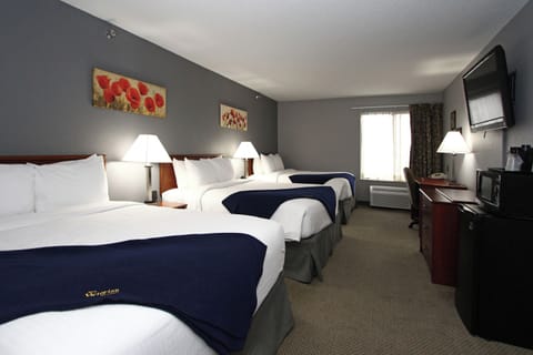 Suite, Multiple Beds (Triple Queen) | Desk, blackout drapes, iron/ironing board, free WiFi