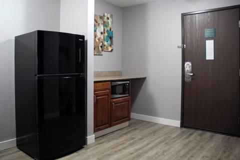 Suite, Multiple Beds (King Queen Suite) | Desk, blackout drapes, iron/ironing board, free WiFi