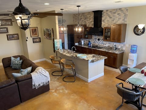Kitchen has a rustic feel with a modern touch.