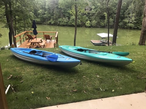 Explore the water with two kayaks and a canoe