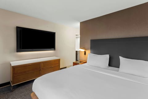 Hypo-allergenic bedding, desk, blackout drapes, iron/ironing board