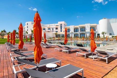 Outdoor pool, open 9:00 AM to 7:00 PM, cabanas (surcharge)