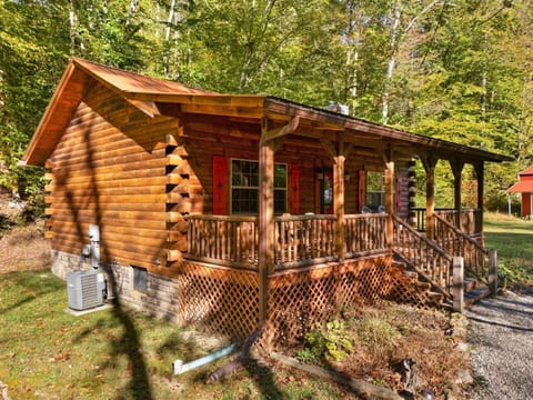 Cozy log cabin porch perfect for morning coffee and relaxation