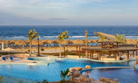 Private beach, beach umbrellas, beach towels, beach volleyball