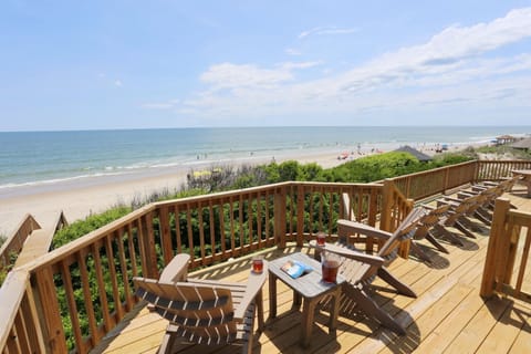 Relax out on the Oceanfront Deck with a cool drink and your favorite beach read.