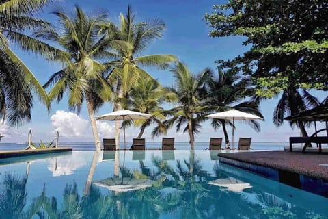 2 outdoor pools, pool umbrellas, sun loungers
