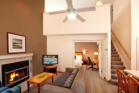 Suite, 2 Bedrooms, Fireplace | In-room safe, desk, laptop workspace, iron/ironing board