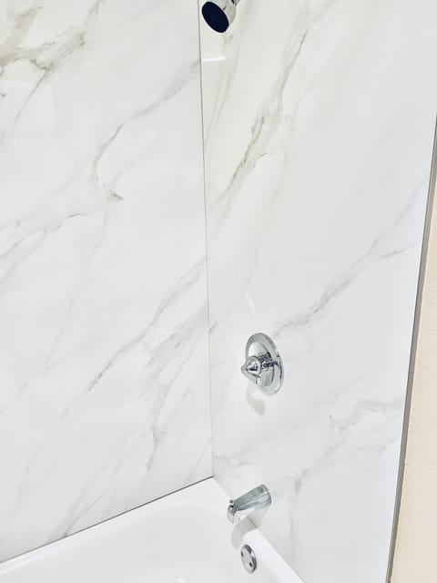 Room, 2 Queen Beds | Bathroom | Combined shower/tub, free toiletries, hair dryer, towels