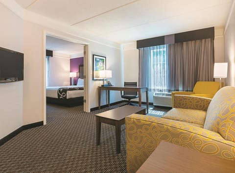 Deluxe Suite, 1 Bedroom, Non Smoking | Premium bedding, desk, laptop workspace, iron/ironing board