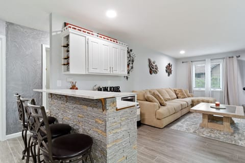 Mid-level family room with bar