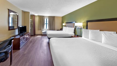 Desk, laptop workspace, blackout drapes, iron/ironing board