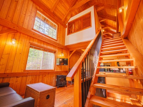 Cabin, 2 Bedrooms (Rainforest) | Living area | 10-inch TV with cable channels