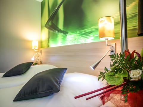 Twin Room | Blackout drapes, iron/ironing board, free cribs/infant beds, free WiFi