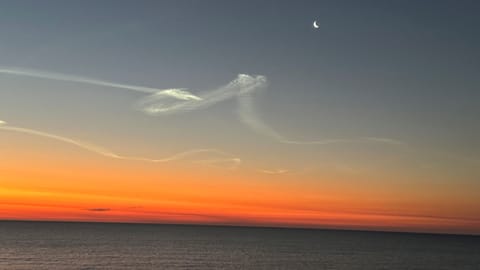 Crescent moon at sunrise.