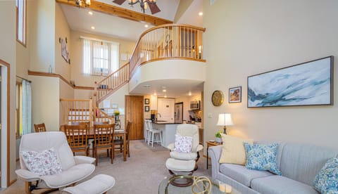 View of open concept living space from the door to the back porch. 