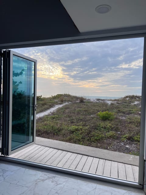 Bifold doors allow you to experience beach from your living room