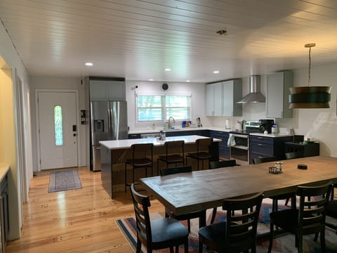 Fully stocked kitchen, microwave, dishwasher, oven