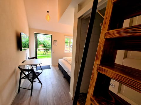Memory foam beds, desk, laptop workspace, soundproofing