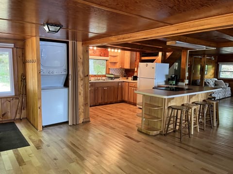 from dining room, laundry machines and kitchen