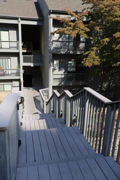 Stairway down to 2nd story condo, Unit 1111.