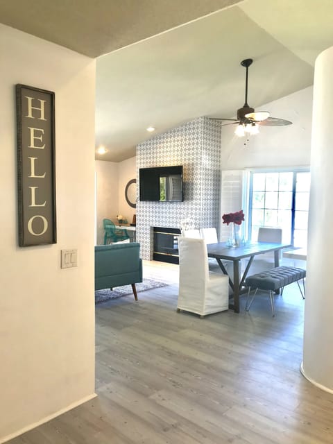Main Room with Views of the Pool,  vaulted ceilings and cozy fireplace. 