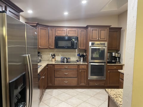 Full kitchen with updated appliances and granite counter
