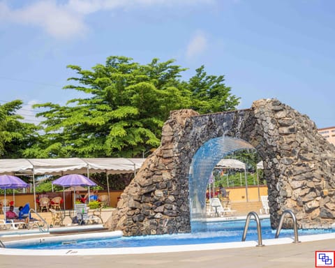 Outdoor pool, open 8:00 AM to 9:00 PM, pool umbrellas, sun loungers