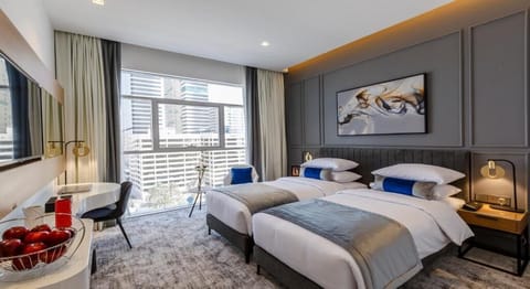 Executive Twin Room | Down comforters, in-room safe, individually furnished, desk