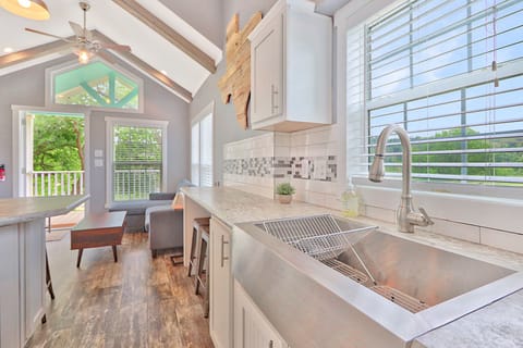Full sized sink in the kitchen.