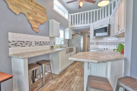 Kitchenette and bar dining.