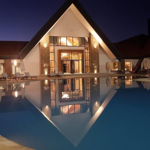 2 outdoor pools, pool umbrellas, sun loungers