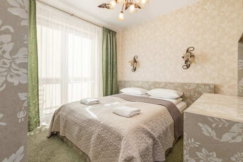 Cozy bedroom in the apartment. 