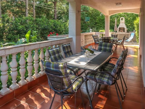 Furniture, Table, Plant, Property, Chair, Wood, Outdoor Furniture, Outdoor Table, Building, Tree