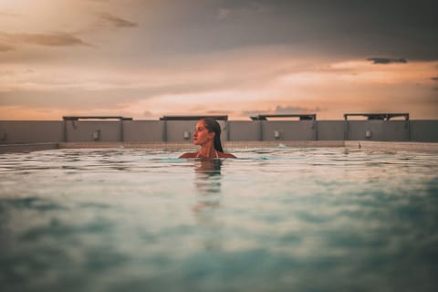 Outdoor pool, open 9:00 AM to 8:00 PM, pool umbrellas, sun loungers