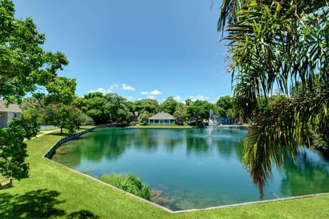 St. Simons Water View Patio – Ocean Walk W-14 - Sip your morning coffee on the private patio while ducks glide across the pond. This St. Simons Island view pairs perfectly with a slow start and a good breeze.