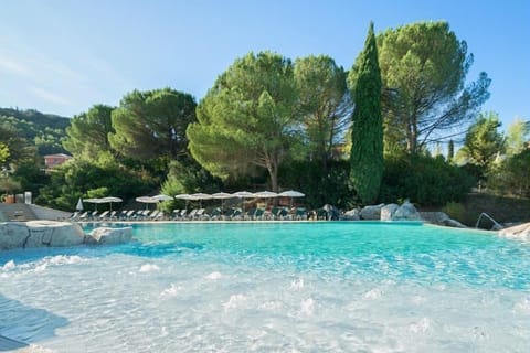 Water slides and splash features at the pool — the kind of afternoon that keeps the kids busy all day.