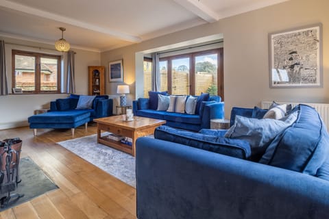 Monkey Puzzle Cottage, Snettisham: Sitting room with two sets of french doors to garden