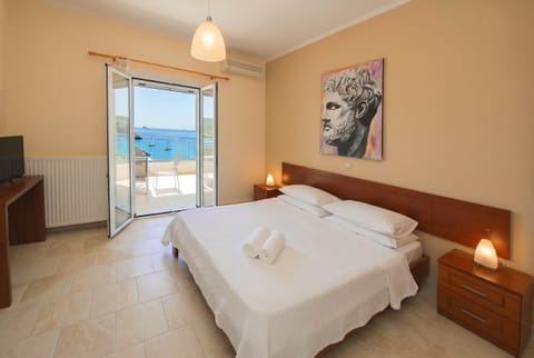 Platakia blu apartment 01 primary bedroom sea view