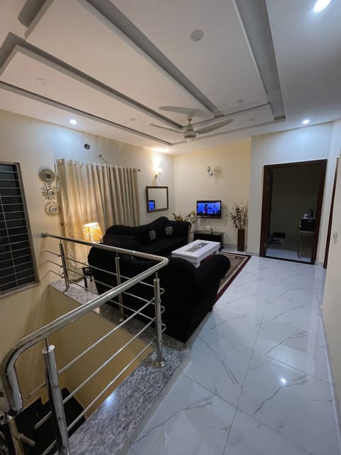 House | Living room | 30-inch TV with digital channels