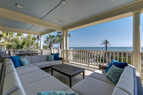 First floor porch overlooking pool and ocean