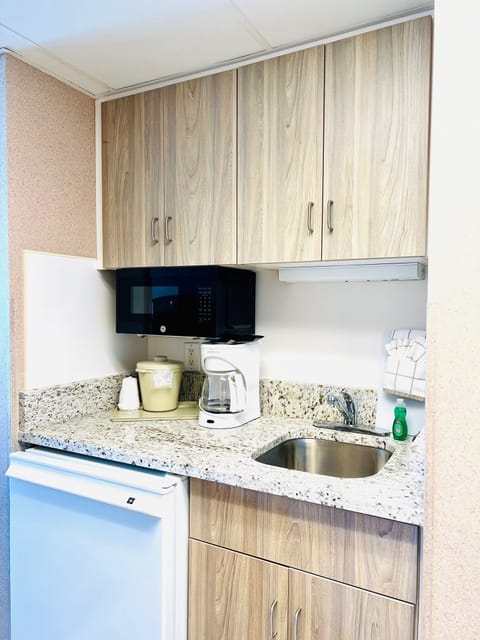 Fridge, microwave, coffee/tea maker, toaster