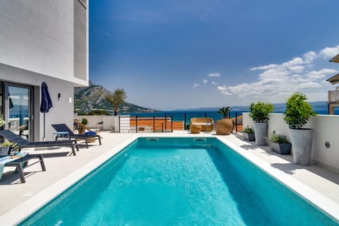 Seaview villa Mila with 4 en-suite bedrooms, private heated pool, Finnish sauna, Treadmill