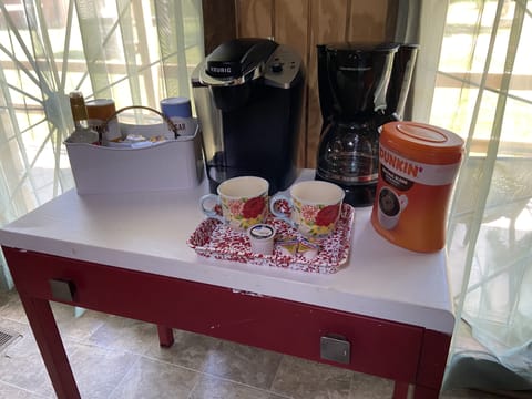 Coffee bar with everything you need to enjoy a cup of coffee on the porch. 