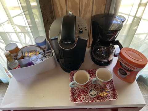 Coffee bar with everything you need to enjoy a cup of coffee on the porch. 