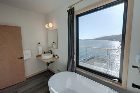 Luxe Ice House King 2nd Floor | Bathroom | Hair dryer, bathrobes, slippers, towels