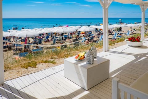 Private beach, sun loungers, beach umbrellas, beach bar