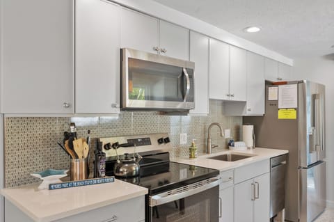 A new Kitchen with stainless appliances