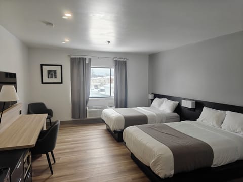 Standard Room, 2 Double Beds | Desk, laptop workspace, soundproofing, free WiFi