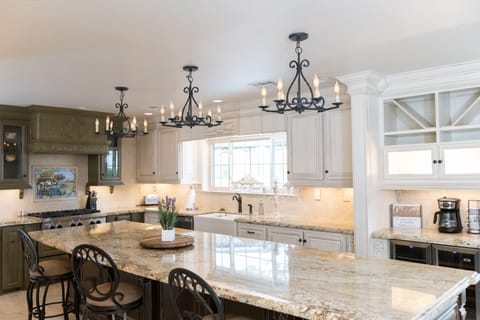 Our gorgeous eat-in, custom kitchen space is perfect for gathering. 