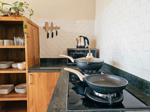 Villa | Private kitchen | Fridge, microwave, electric kettle, freezer